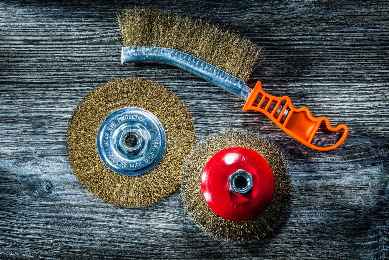 Used Crimped Wire Brushes on Vintage Wooden Board Stock Photo Image