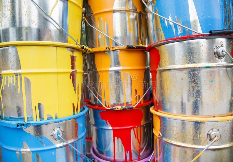The Used Paint Cans. Colorful Paint Buckets. Stock Photo Image of