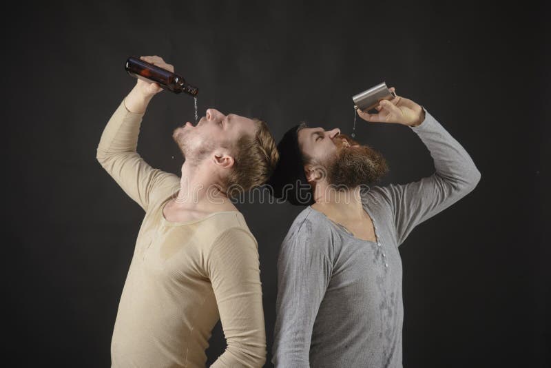 Used To Drink Alcohol. Hard Drinkers. Men Drinking Alcohol from Bottle ...