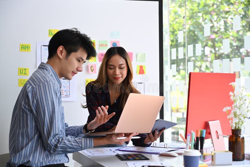 User experience designers team brainstorming and planning sketch, prototype, framework, layout app design project at office. stock images