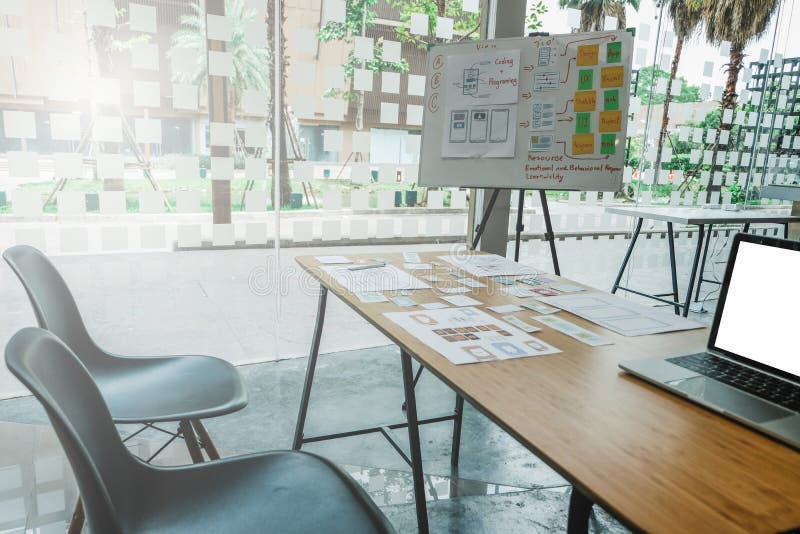 User experience UX designer designing web on smart phone layout. UI developer planning working on mobile application prototype stock photography