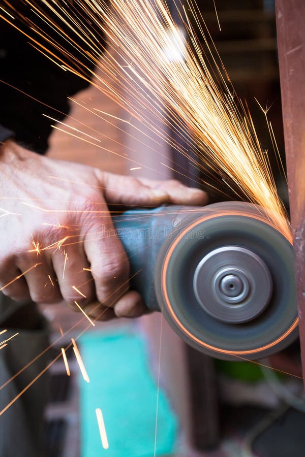 Using Angle Grinder To Cut Metal Stock Image Image of metalworking