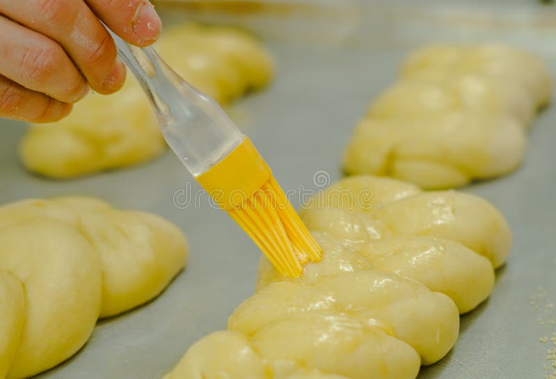 Using Brush Applying Butter on Top of Beautiful Kringle Dough