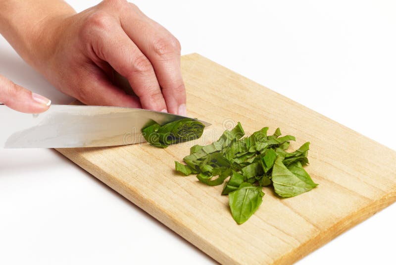 Using kitchen knife to cut stock photo. Image of holding 23056362