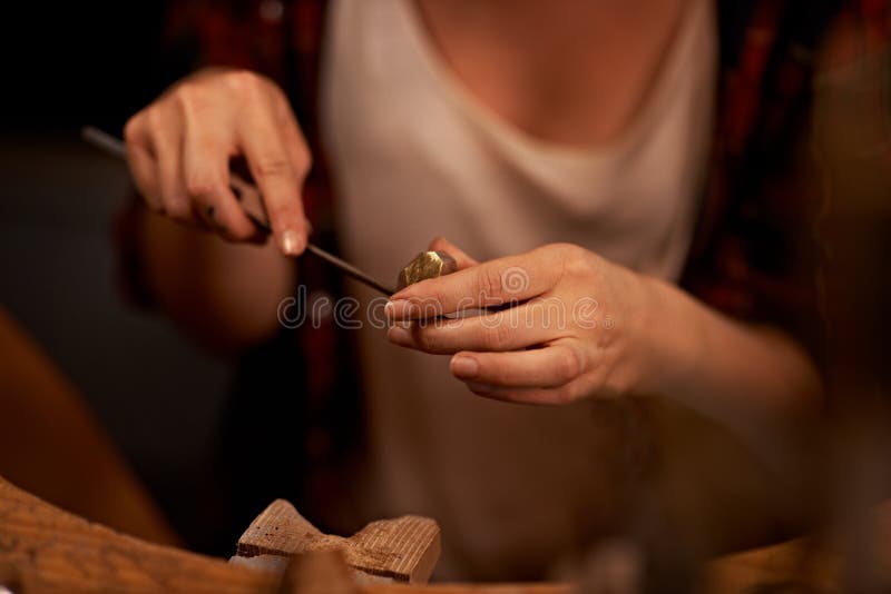 Using my skills to create. An artist creating something out of wood. royalty free stock photo