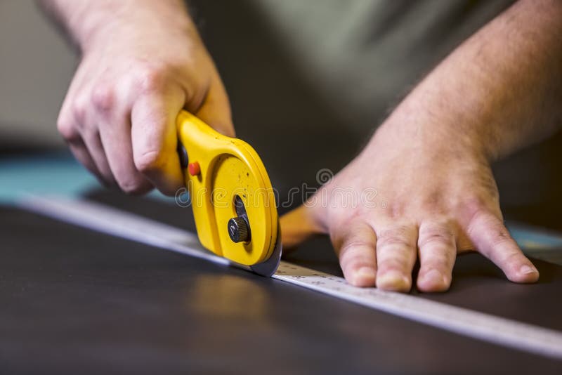 Using a Rotary Leather Cutter Stock Photo Image of metal, hide 136280530