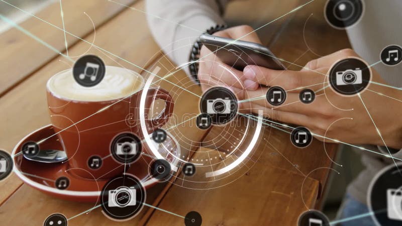 Using smartphone with animation digital icons, person having coffee on table stock video