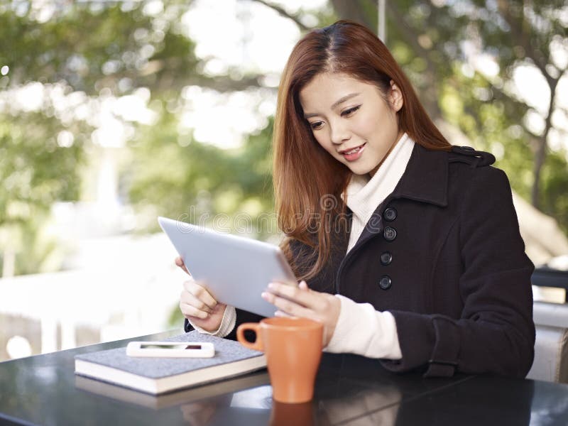 Using tablet stock image