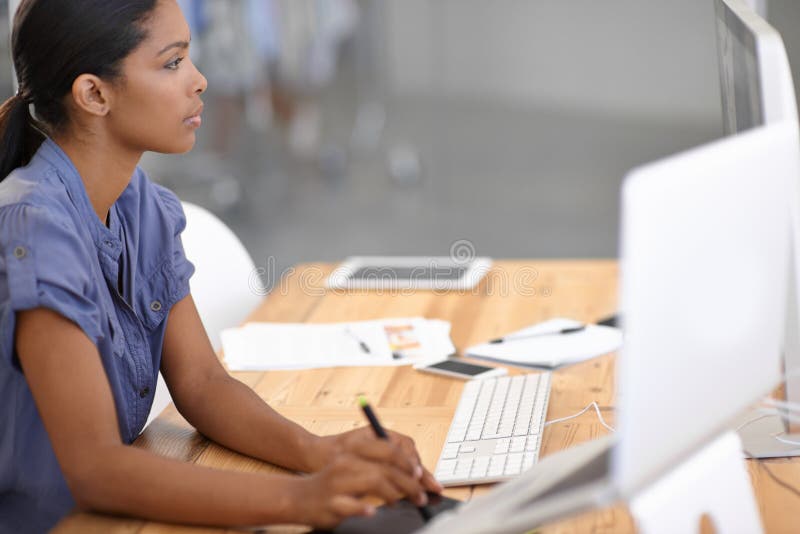 Using Technology To Get the Job Done. an Attractive Young Businesswoman Using a Wireless Device