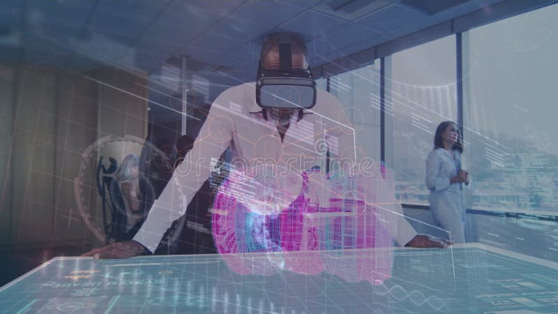 Using virtual reality headset, man interacting with animation data in modern office stock video