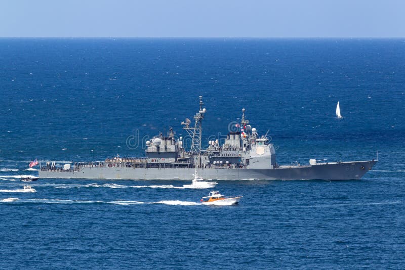 Sydney, Australia - October 4, 2013: USS Chosin CG-65 Ticonderoga-class guided-missile cruiser serving in the United States Navy entering Sydney Harbor