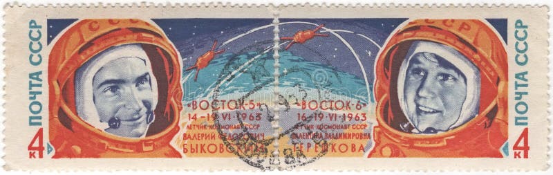 Postage stamp printed in USSR shows portraits of cosmonauts Valery Bykovsky and Valentina Tereshkova, from the series `Cosmonauts