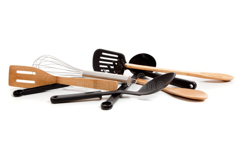 Assorted kitchen utensils including spatula, wooden spoon, egg turner, whisk, pasta ladle and slotted spoon. Assorted kitchen utensils including spatula, wooden spoon, egg turner, whisk, pasta ladle and slotted spoon