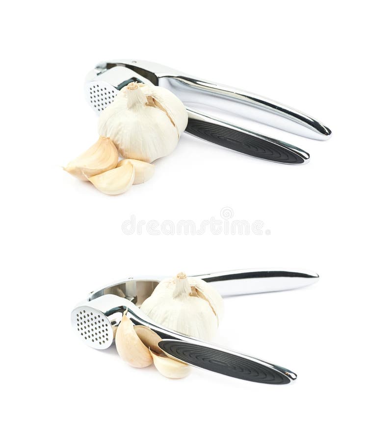 Utensílio da imprensa de alho do metal isolado fotografia de stock royalty free Utensílio da imprensa de alho do metal isolado fotografia de stock royalty free
