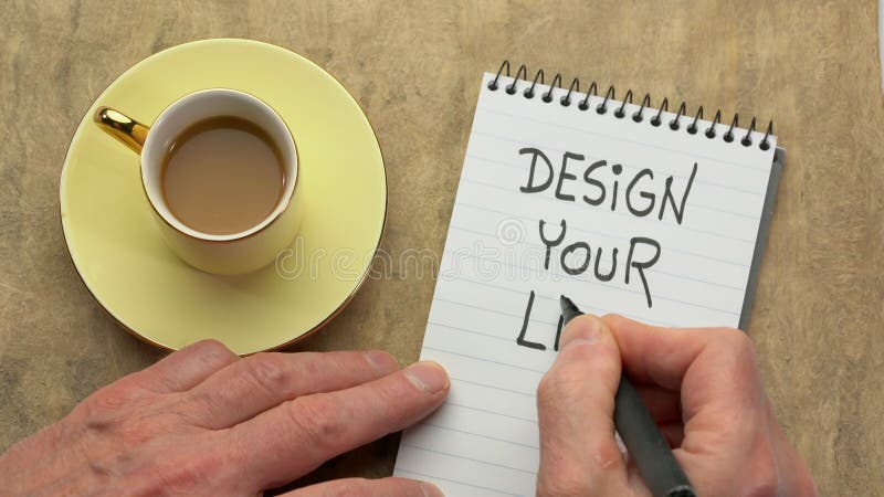 Utforma ditt liv - en hand som skriver en anteckning