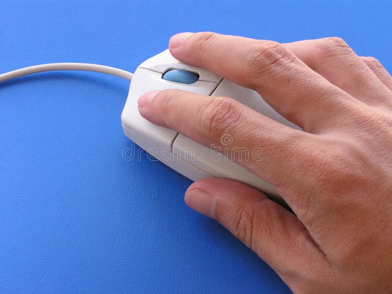 Utilisant la souris image libre de droits