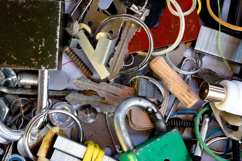 Utiliti room mess of things in storage, mixture of keys,pins,screws,etc. Old home mess