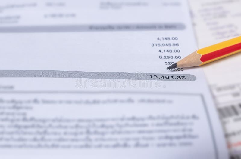 utility-energy-bill-with-pencil-blurred-background-stock-photo-image