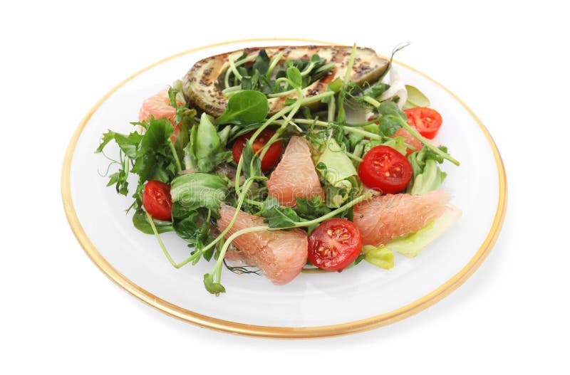 Utsökt pomelosallad med grillad avokado och tomater på vit bakgrund arkivfoton