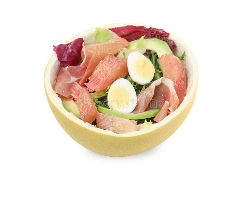 Utsökt pomelosallad med prosciutto i hälften av frukten isolerad på vitt fotografering för bildbyråer