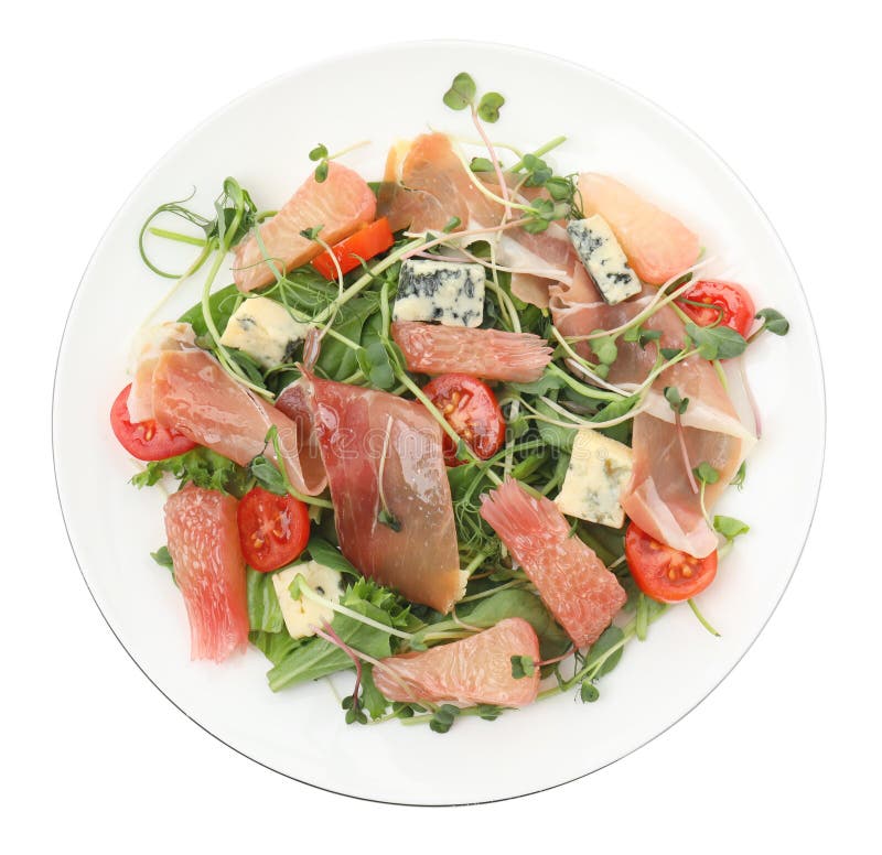 Utsökt pomelosallad med prosciutto och ost på vit bakgrund royaltyfri bild