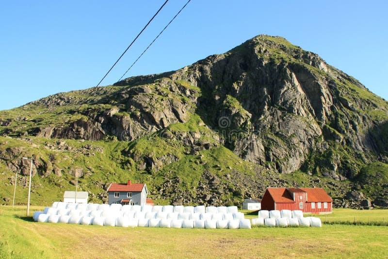 Uttakleiv s house, barn and hay bales