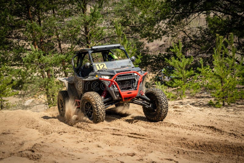 UTV, ATV, 4x4 Off Road Vehicle in Sandy Open Area. Buggy Extreme Riding