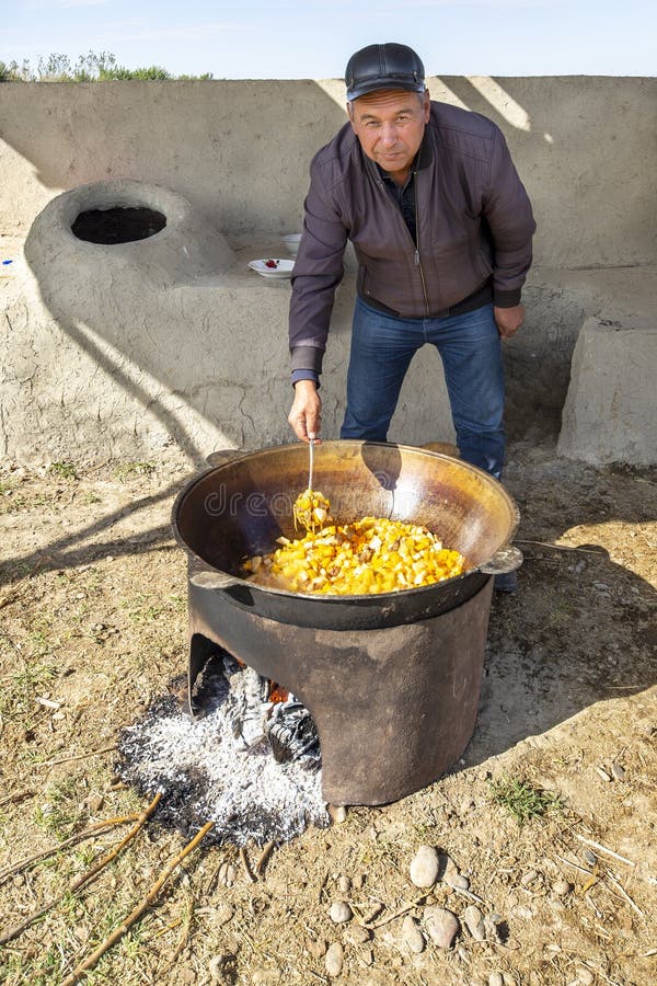 Stirring large pot hi-res stock photography and images - Alamy