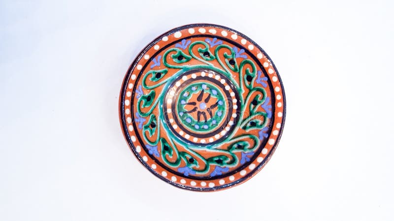 Uzbeka garncarstwo - puchar robić ceramics Gijduvan który kłama blisko Bukhara, uwydatniają ciepłych Złotych i brown kolory fotografia royalty free Uzbeka garncarstwo - puchar robić ceramics Gijduvan który kłama blisko Bukhara, uwydatniają ciepłych Złotych i brown kolory fotografia royalty free