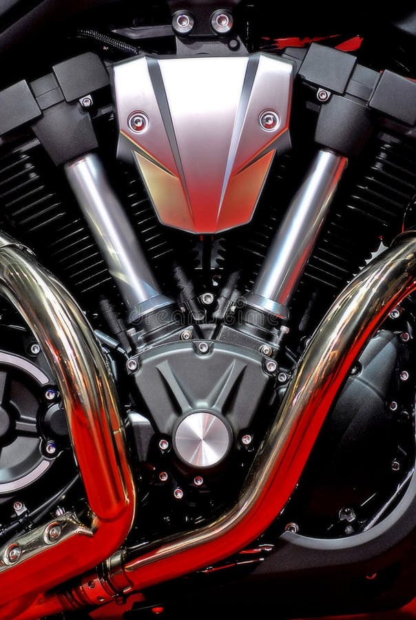 A closeup view of a V-Twin type engine of a motorcycle.