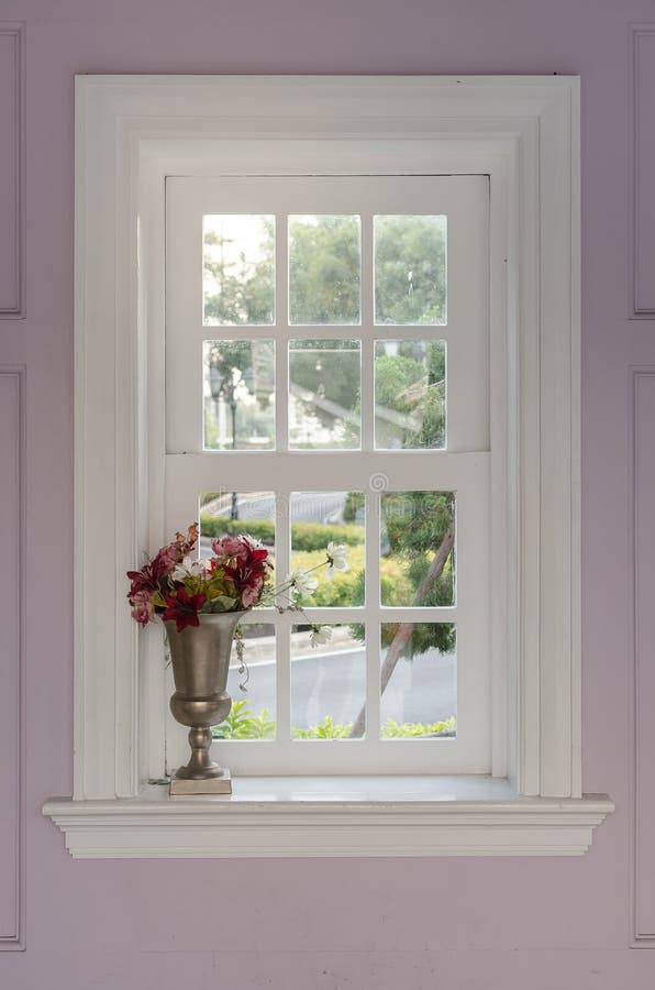 Vase of flower with window frame at home. Vase of flower with window frame at home