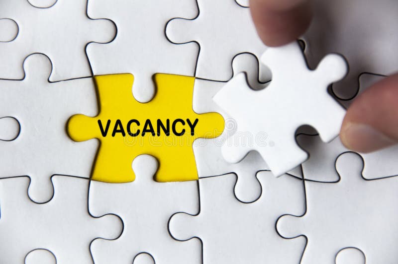 Vacancy Text on Missing Jigsaw Puzzle. Employment and Hiring Concept
