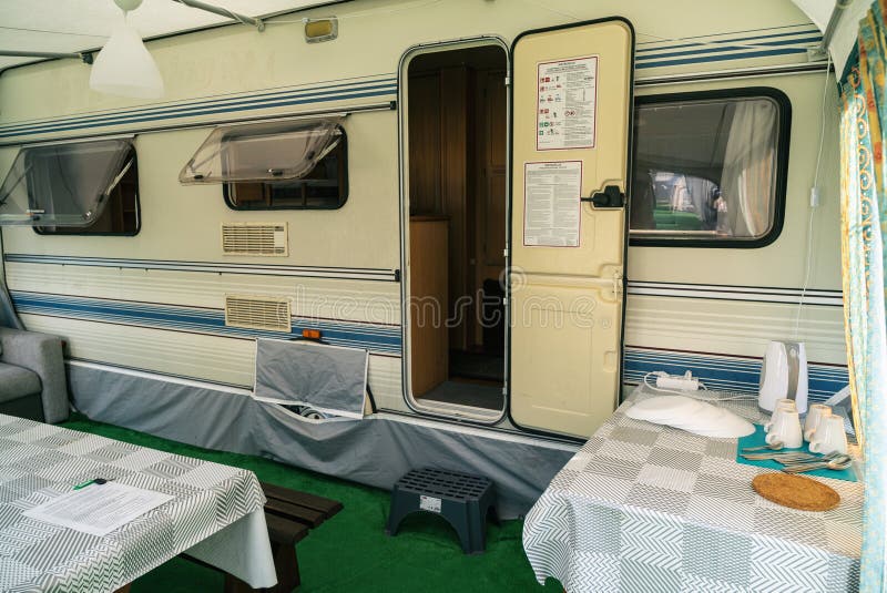 Vacation in camper, caravan. Interrior rooms of Camper caravan car. Holiday on camping