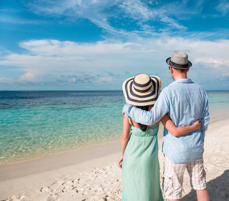 Vacation Couple Walking On Tropical Beach Maldives Stock