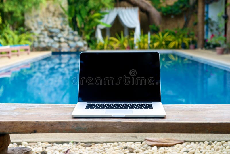 Vacation Work with Laptop on Bench at Pool Stock Image Image of