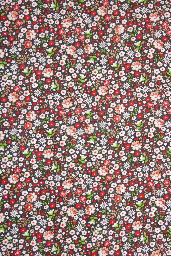 Vacker kalibro-textur med broderade blommor på aktiv bakgrund arkivbild