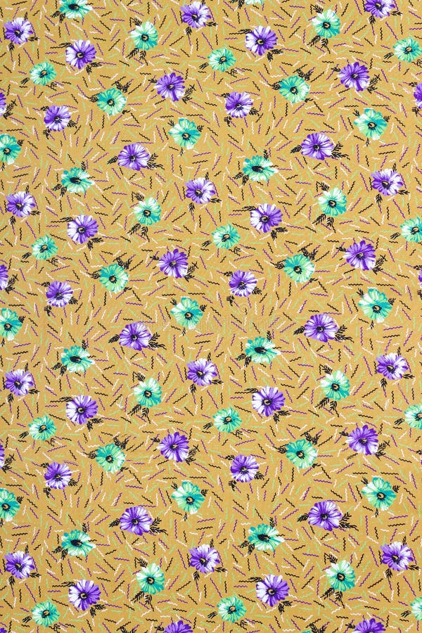 Vacker kalibro-textur med broderade blommor på aktiv bakgrund royaltyfri bild