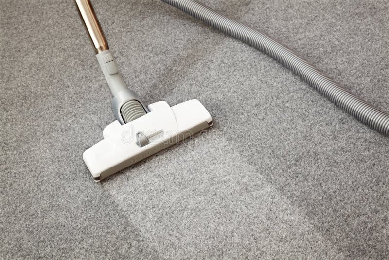 Cleaning Inside Heating Floor Vent with Vacuum Cleaner Stock Image