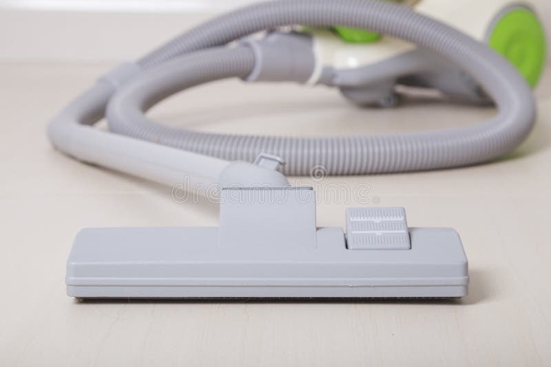 Vacuum cleaner on floor stock image. Image of housework 89864681