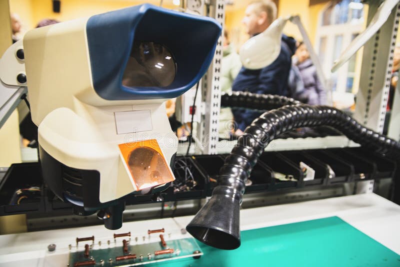 Vacuum cleaner for garbage collection in the workshop for repair of electrical circuits stock image