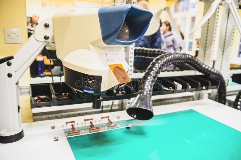 Vacuum cleaner for garbage collection in the workshop for repair of electrical circuits stock photos