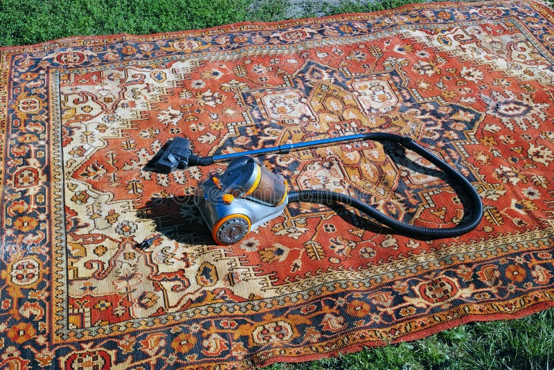 Vacuum Cleaner on an Old Carpet Stock Photo Image of appliances, home 97975186