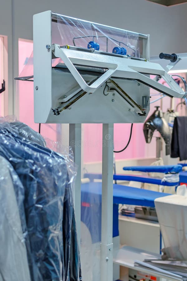 The Vacuum Packer of Clean Clothes in a Laundry Stock Image Image of