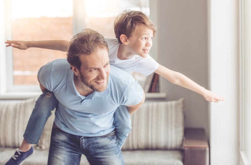 Vader en zoon stock afbeeldingen Vader en zoon stock afbeeldingen
