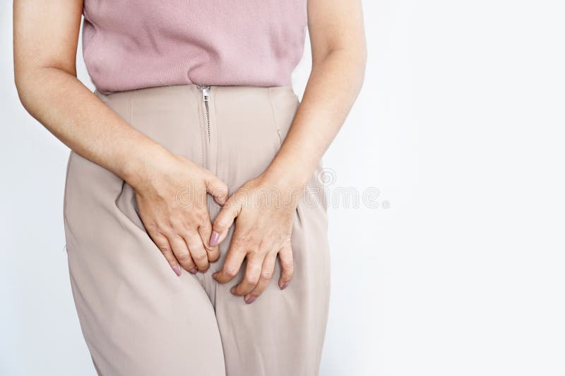 Women are scratching the crotch, itching crotch, Concept with healthcare  and medicine. Stock Photo