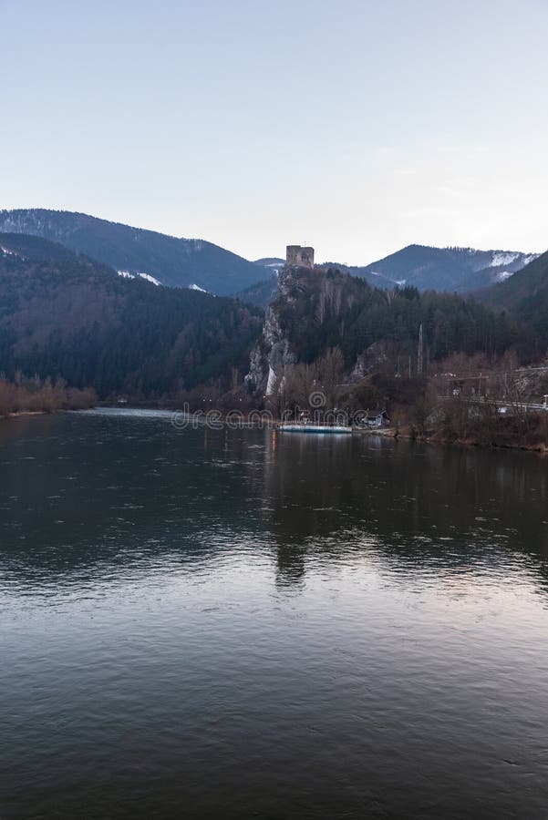 Vah river with Strecno castle ruins and hills of Mala Fatra mountains above in Slovakia