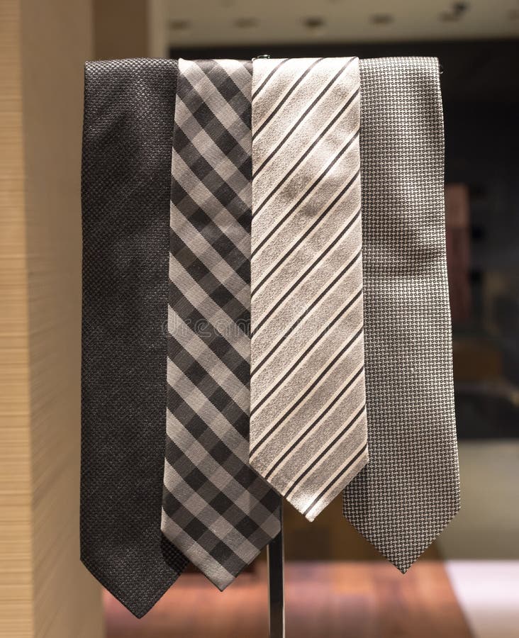 Four Silver Ties with Different Patterns. Four Silver Ties with Different Patterns