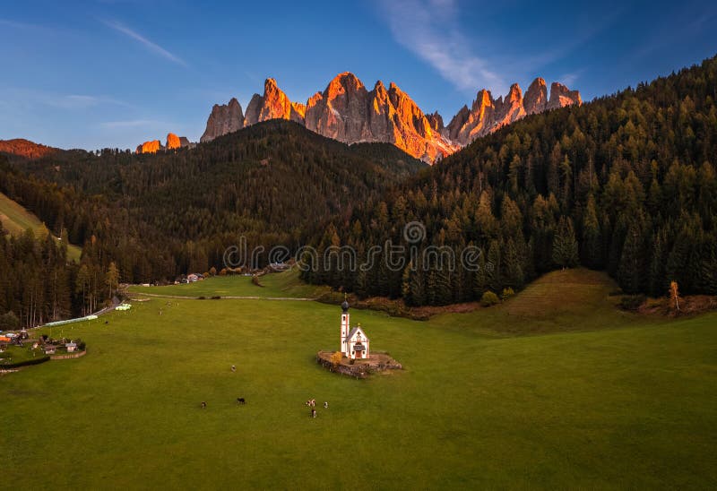Val Di Funes, Dolomites, Italy - Aerial view of the beautiful St. Johann Church Chiesetta di San Giovanni in Ranui South Tyrol