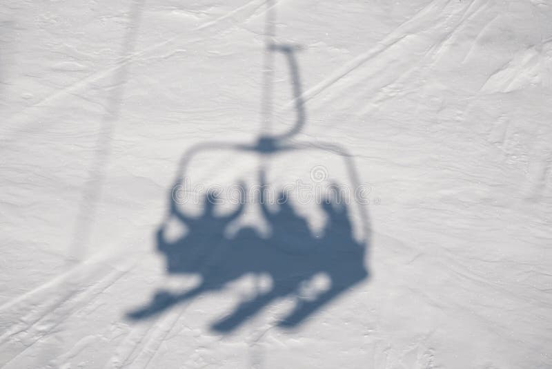 Val di Sole Park people shadows on the lift in Trentino, Italy