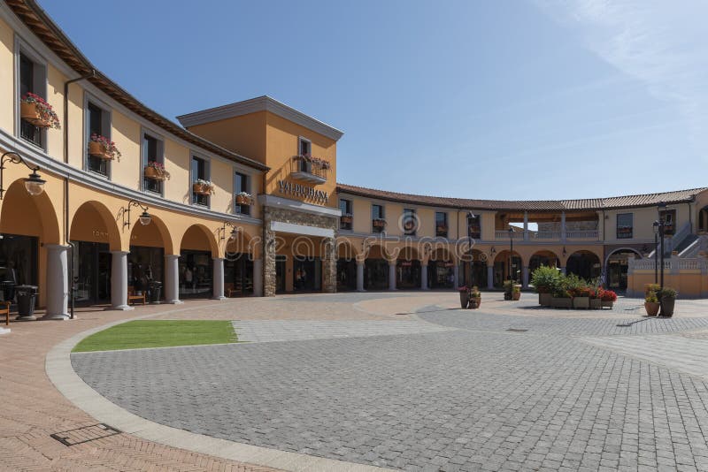 Valdichiana Outlet Village, Italy 09/17/2019: Main Square of the ...